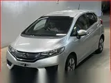 2015 Honda Fit Hibrid Push Start Hybrid F Package Silver Sedan for sale, Japanese used car export - photo 1 of 25 | GULJI TRADERS