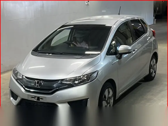2015 Honda Fit Hibrid Push Start Hybrid F Package Silver Sedan for sale, Japanese used car export - photo 1 of 25 | GULJI TRADERS