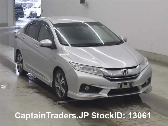 2015 Honda Grace - photo 1 2015 Honda Grace Silver Sedan for sale, Japanese used car export - photo 1 of 30 | GULJI TRADERS