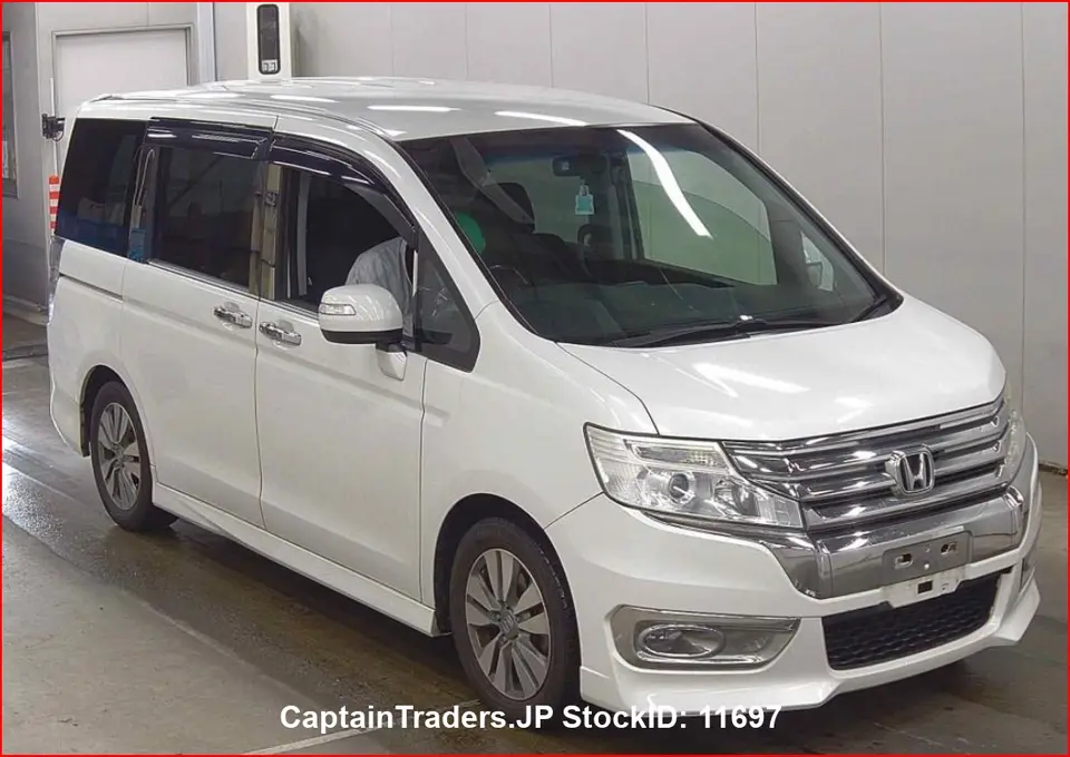 2014 Honda Step Wagon Spada - photo 1 2014 Honda Step Wagon Spada Pearl Van for sale, Japanese used car export | GULJI TRADERS