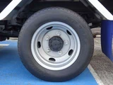 2021 Isuzu ELF Truck 4WD 5MT Truck for sale, Japanese used car export - photo 64 of 78 | GULJI TRADERS