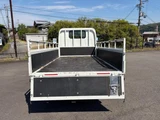 2023 Isuzu ELF Truck Truck for sale, Japanese used car export - photo 18 of 21 | GULJI TRADERS