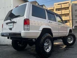 2001 Jeep Cherokee Sport 4WD SUV for sale, Japanese used car export - photo 10 of 11 | GULJI TRADERS