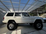 2001 Jeep Cherokee Sport 4WD SUV for sale, Japanese used car export - photo 11 of 11 | GULJI TRADERS