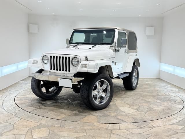 2000 Jeep Wrangler - photo 1 2000 Jeep Wrangler Jeep for sale, Japanese used car export - photo 1 of 9 | GULJI TRADERS