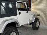 2002 Jeep Wrangler Sport 4WD Jeep for sale, Japanese used car export - photo 37 of 52 | GULJI TRADERS