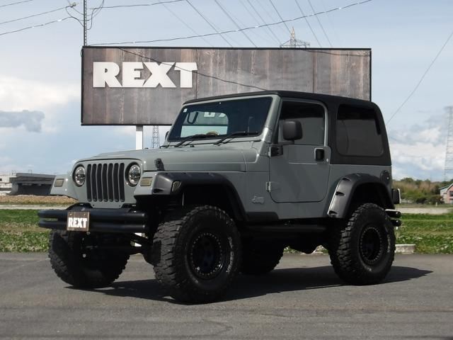 2004 Jeep Wrangler 4WD - photo 1 2004 Jeep Wrangler 4WD Jeep for sale, Japanese used car export - photo 1 of 9 | GULJI TRADERS