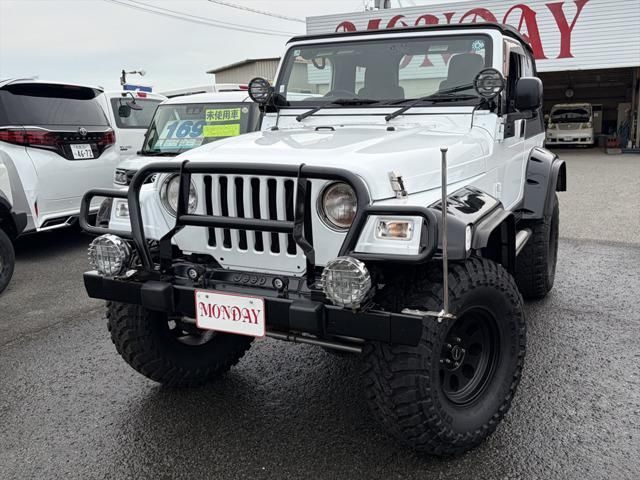 2005 Jeep Wrangler Sport 4WD - photo 1 2005 Jeep Wrangler Sport 4WD Jeep for sale, Japanese used car export - photo 1 of 20 | GULJI TRADERS