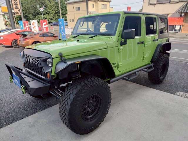 2012 Jeep Wrangler Sport 4WD - photo 1 2012 Jeep Wrangler Sport 4WD Jeep for sale, Japanese used car export - photo 1 of 59 | GULJI TRADERS