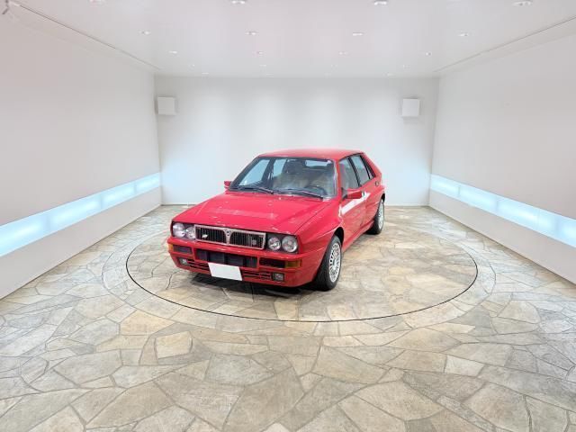 1994 Lancia Delta HF Red Sedan for sale, Japanese used car export - photo 1 of 9 | GULJI TRADERS