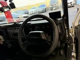 2004 Land Rover Defender 110 Silver Jeep for sale, Japanese used car export - photo 7 of 9 | GULJI TRADERS