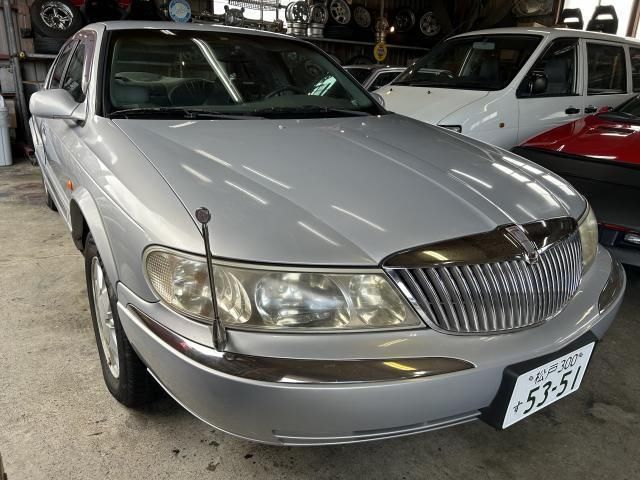 1998 Lincoln Continental Dealer car - photo 1 1998 Lincoln Continental Dealer car Silver Sedan for sale, Japanese used car export | GULJI TRADERS