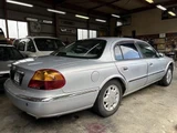 1998 Lincoln Continental Dealer car Silver Sedan for sale, Japanese used car export - photo 3 of 9 | GULJI TRADERS