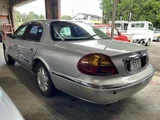 1998 Lincoln Continental Dealer car Silver Sedan for sale, Japanese used car export - photo 4 of 9 | GULJI TRADERS
