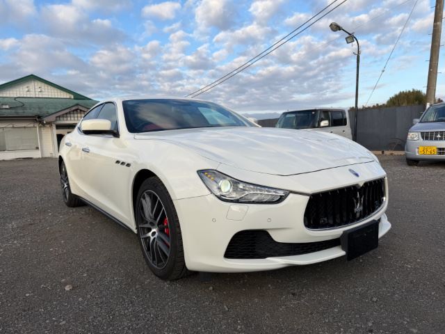 2014 Maserati Ghibli Base - photo 1 2014 Maserati Ghibli Base Sedan for sale, Japanese used car export - photo 1 of 26 | GULJI TRADERS