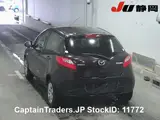 2010 Mazda Demio Brown Sedan for sale, Japanese used car export - photo 3 of 4 | GULJI TRADERS