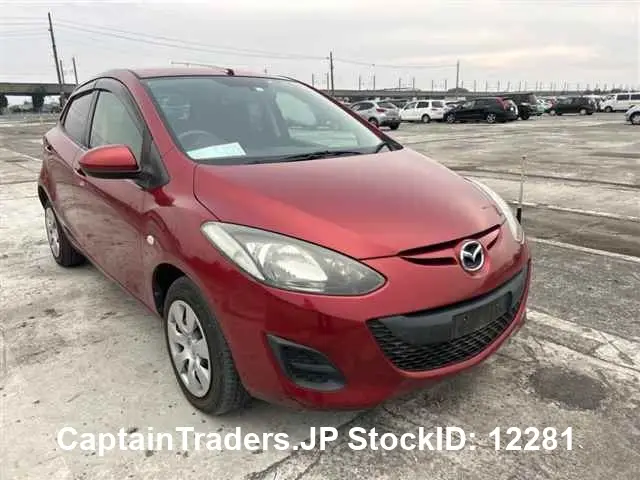 2014 Mazda Demio - photo 1 2014 Mazda Demio Red Sedan for sale, Japanese used car export | GULJI TRADERS