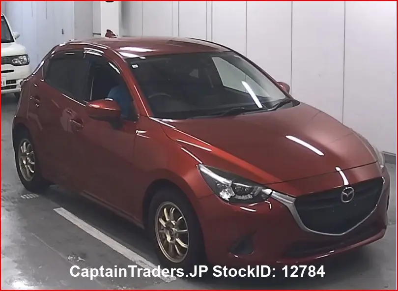 2017 Mazda Demio - photo 1 2017 Mazda Demio Red Sedan for sale, Japanese used car export | GULJI TRADERS