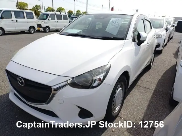 2018 Mazda Demio White Sedan for sale, Japanese used car export | GULJI TRADERS