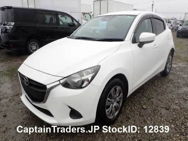 2018 Mazda Demio White Sedan for sale, Japanese used car export - photo 1 of 10 | GULJI TRADERS