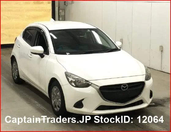 2018 Mazda Demio - photo 1 2018 Mazda Demio White Sedan for sale, Japanese used car export | GULJI TRADERS