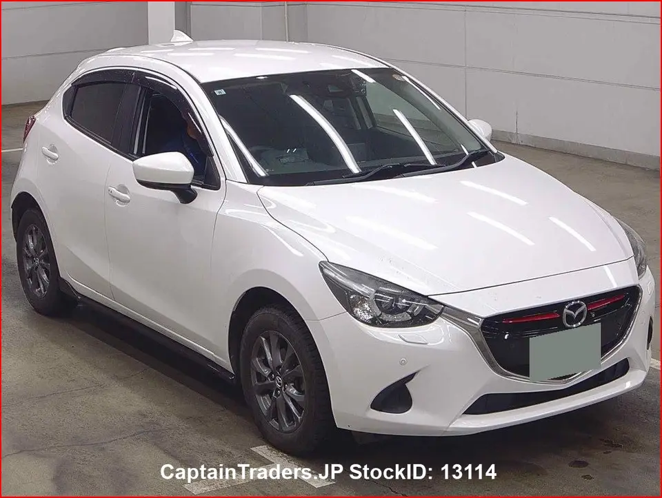 2019 Mazda Demio - photo 1 2019 Mazda Demio Pearl Sedan for sale, Japanese used car export - photo 1 of 7 | GULJI TRADERS