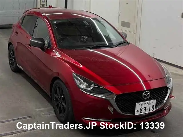 2020 Mazda Mazda 2 Red Sedan for sale, Japanese used car export - photo 1 of 11 | GULJI TRADERS