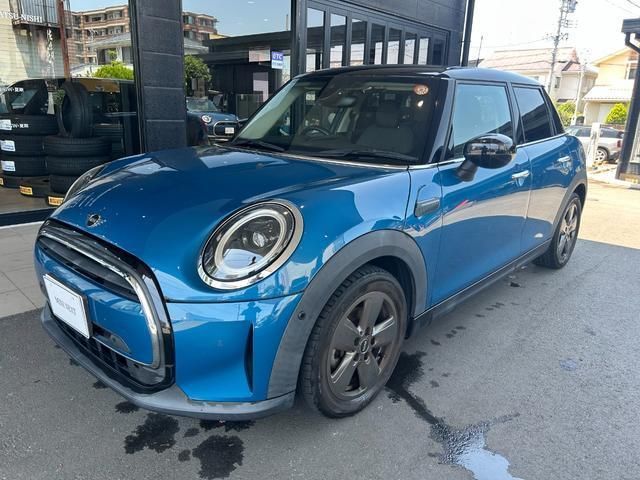 2022 MINI Hatch - photo 1 2022 MINI Hatch Blue Sedan for sale, Japanese used car export - photo 1 of 9 | GULJI TRADERS