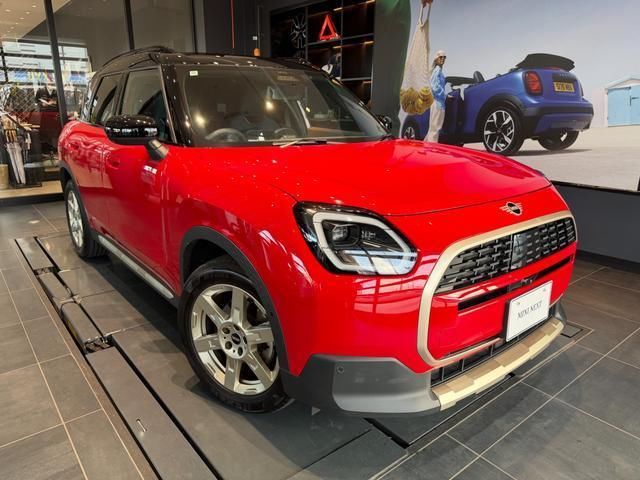 2024 MINI Hatch Countryman D Favourite - photo 1 2024 MINI Hatch Countryman D Favourite Red SUV for sale, Japanese used car export - photo 1 of 9 | GULJI TRADERS