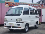 1995 Mitsubishi Bravo 660 High Roof 4WD White Sedan for sale, Japanese used car export - photo 1 of 49 | GULJI TRADERS