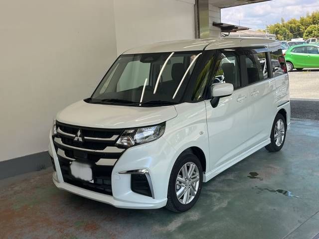 2026 Mitsubishi Delica D:2 Hybrid MX - photo 1 2026 Mitsubishi Delica D:2 Hybrid MX Sedan for sale, Japanese used car export - photo 1 of 8 | GULJI TRADERS
