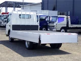 2026 Mitsubishi Fuso Canter Flatbed aluminum block wide long unused vehicle 4.8t White Truck for sale, Japanese used car export - photo 37 of 51 | GULJI TRADERS