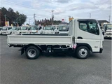 2026 Mitsubishi Fuso Canter 2-ton capacity, flatbed, low-floor, manual transmission (MT5), under 5 tons. White Truck for sale, Japanese used car export - photo 4 of 69 | GULJI TRADERS