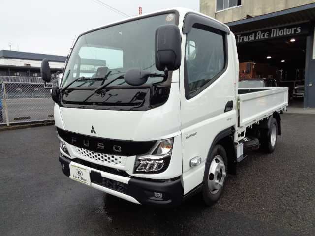 2026 Mitsubishi Fuso Canter 2-ton flatbed low-floor truck White Truck for sale, Japanese used car export - photo 1 of 20 | GULJI TRADERS