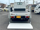2026 Mitsubishi Fuso Canter 2-ton flatbed with vertical gate, collision mitigation braking, 5-speed manual transmission, unused vehicle. White Truck for sale, Japanese used car export - photo 9 of 51 | GULJI TRADERS