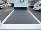 2026 Mitsubishi Fuso Canter 2-ton flatbed with vertical gate, collision mitigation braking, 5-speed manual transmission, unused vehicle. White Truck for sale, Japanese used car export - photo 10 of 51 | GULJI TRADERS