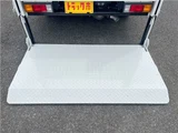 2026 Mitsubishi Fuso Canter 2-ton flatbed with vertical gate, collision mitigation braking, 5-speed manual transmission, unused vehicle. White Truck for sale, Japanese used car export - photo 13 of 51 | GULJI TRADERS