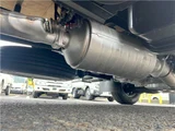 2026 Mitsubishi Fuso Canter 2-ton flatbed with vertical gate, collision mitigation braking, 5-speed manual transmission, unused vehicle. White Truck for sale, Japanese used car export - photo 44 of 51 | GULJI TRADERS