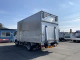 2026 Mitsubishi Fuso Canter Power tailgate, side doors, 2WD White Truck for sale, Japanese used car export - photo 6 of 21 | GULJI TRADERS