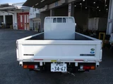 2026 Mitsubishi Fuso Canter 2-ton short flatbed truck with torii gate steel plate. Other Truck for sale, Japanese used car export - photo 7 of 14 | GULJI TRADERS