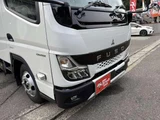 2026 Mitsubishi Fuso Canter 3.0 Double Cab Low Floor Diesel White Truck for sale, Japanese used car export - photo 12 of 16 | GULJI TRADERS