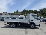 2026 Mitsubishi Fuso Canter Flatbed White Truck for sale, Japanese used car export - photo 5 of 9 | GULJI TRADERS