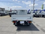 2026 Mitsubishi Fuso Canter Flatbed White Truck for sale, Japanese used car export - photo 2 of 8 | GULJI TRADERS