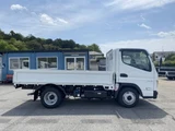 2026 Mitsubishi Fuso Canter Flatbed White Truck for sale, Japanese used car export - photo 5 of 8 | GULJI TRADERS
