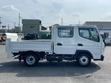 2026 Mitsubishi Fuso Canter 2-ton double cab, low-floor, 6-speed automatic transmission White Truck for sale, Japanese used car export - photo 4 of 9 | GULJI TRADERS