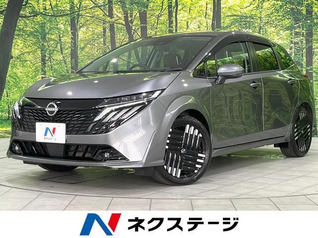 2025 Nissan Aura G FOUR - photo 1 2025 Nissan Aura G FOUR Sedan for sale, Japanese used car export | GULJI TRADERS