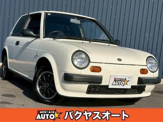 1987 Nissan BE-1 Base - photo 1 1987 Nissan BE-1 Base Sedan for sale, Japanese used car export | GULJI TRADERS
