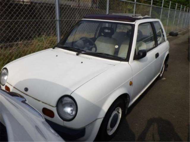 1987 Nissan BE-1 1.0 - photo 1 1987 Nissan BE-1 1.0 Sedan for sale, Japanese used car export - photo 1 of 6 | GULJI TRADERS