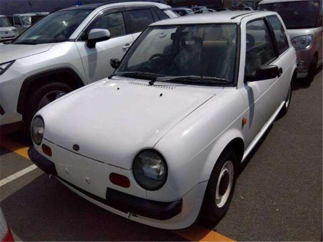 1987 Nissan BE-1 Base - photo 1 1987 Nissan BE-1 Base Sedan for sale, Japanese used car export | GULJI TRADERS