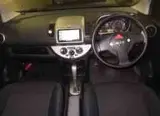 2009 Nissan Note 4WD X Red Van for sale, Japanese used car export - photo 3 of 6 | GULJI TRADERS